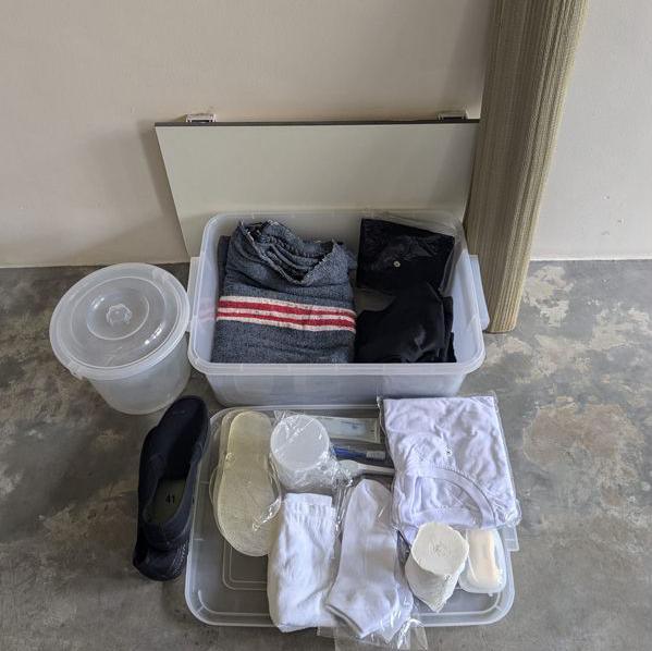 Items including flip-flops, T-shirt, socks and a rush mat, supplied to inmates at Singapore's Drug Rehabilitation Centre 