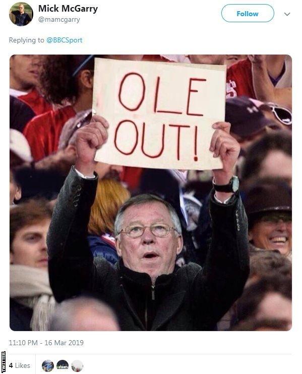 Tweet of Sir Alex Ferguson holding up 'Ole out' banner