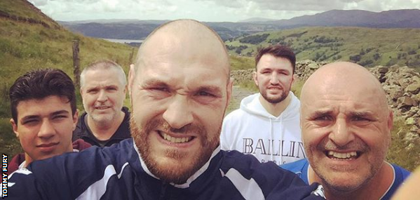 Tommy Fury (left) with uncle Peter, brother Tyson, cousin Hughie and dad John