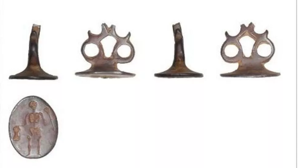 A photo shows four items on the top row. The first item is a metal with a long base which gets thinner. Next to it is another metal shape with two circles either side and four spikes at the top. The pattern repeats. Below the four items is an oval metal with a skeleton etched into the item