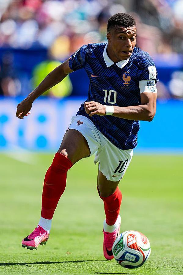 Kylian Mbappe dribbling with the ball for France