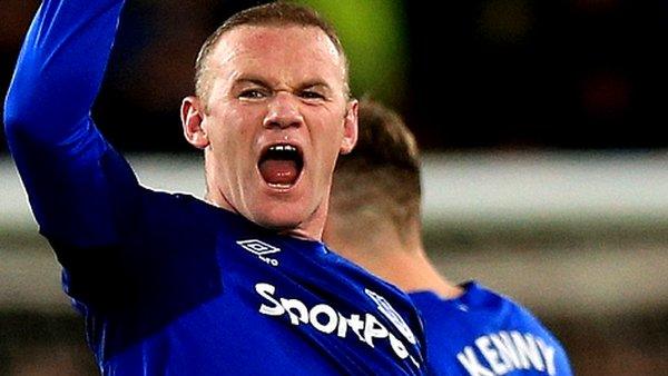 Everton's Wayne Rooney celebrates after scoring from his own half in the 4-0 win over West Ham