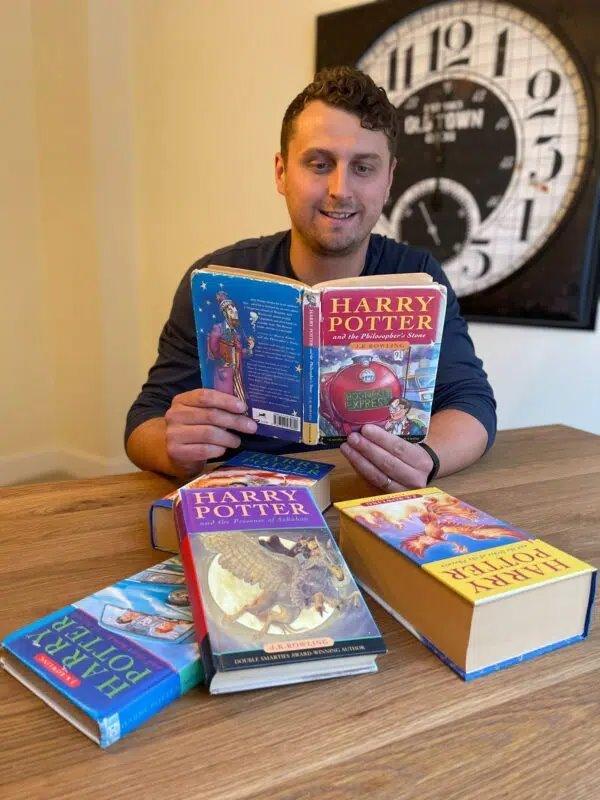 Harry-Potter-with-Harry-Potter-books.