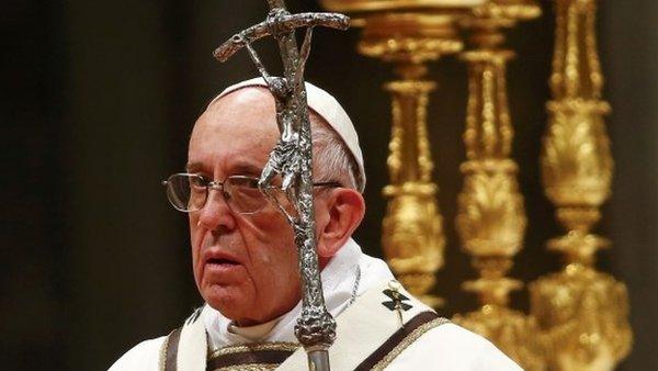 Pope Francis leads the Christmas night Mass in Saint Peter's Basilica at the Vatican December 24, 2016