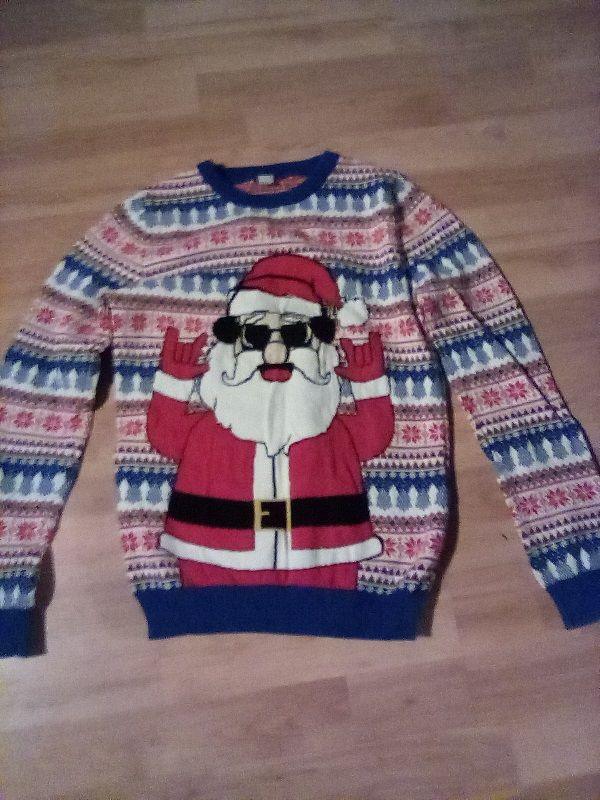 Christmas jumper showing Santa in sunglasses