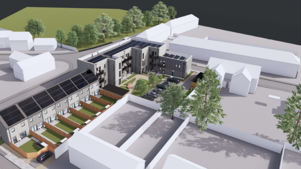 A computer generated image of the rear of a planned housing development in Cheltenham, comprising of terraced homes and a block of flats, with gardens for all buildings.