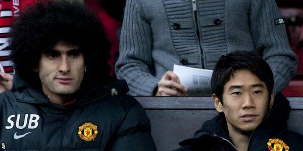 Marouane Fellaini and Shinji Kagawa