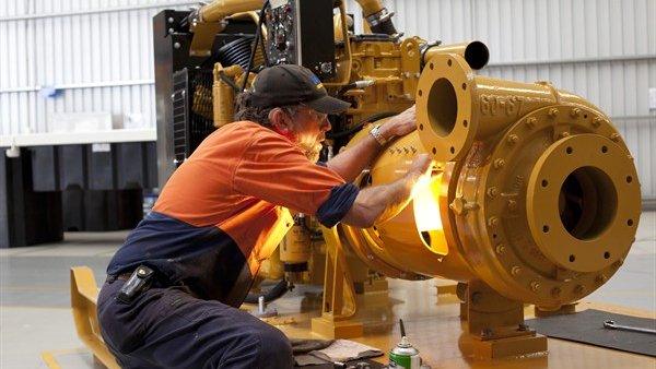 Weir Group employee working on a dewatering pump