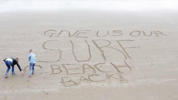 Protesters on Newhaven beach