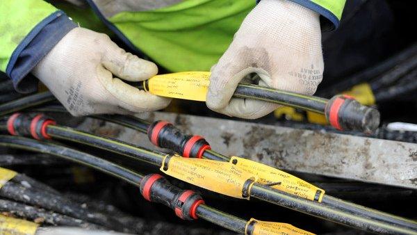 Engineer working on cables