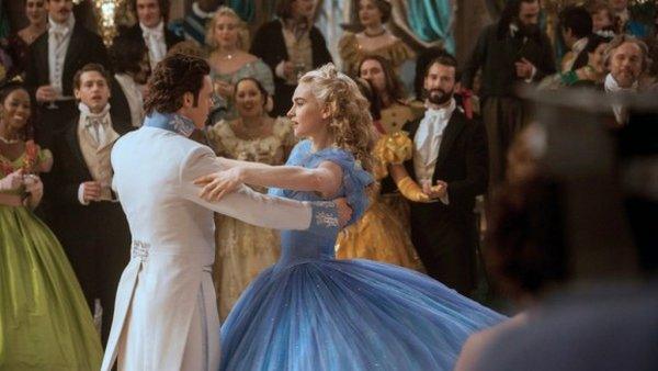 Cinderella (Lily James) and the Prince (Richard Madden) take to the dance floor