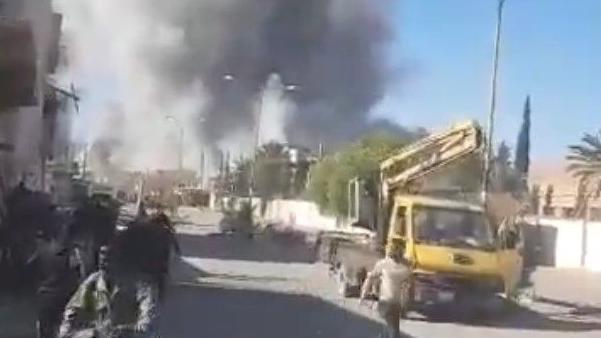 Screengrab of video purportedly showing a large cloud of smoke and dust rising from Palmyra following what the Syrian military said were Israeli air strikes (20 November 2024) 