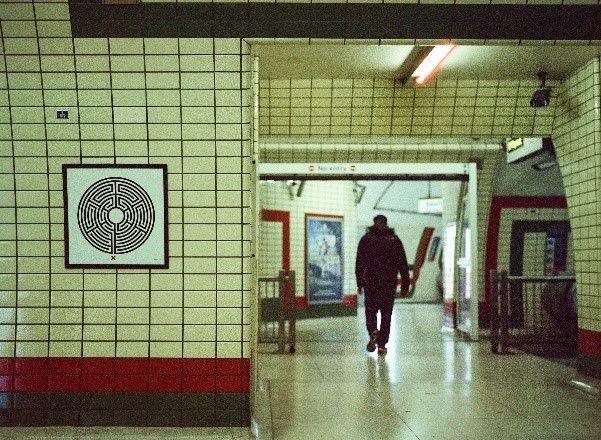 Interchange concourse at Piccadilly Circus Underground station shows maze artwork - photo by Anne Maningas