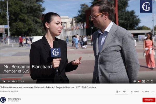 A screenshot of a video from the Times of Geneva website showing a reporter interviewing Benjamin Blanchard