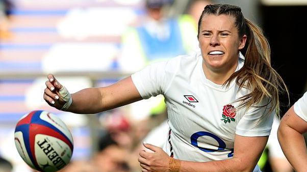 Zoe Harrison (left) in action for England