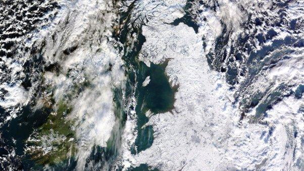 Satellite image showing Great Britain covered in snow and ice (Image: NEODAAS/University of Dundee/PA)