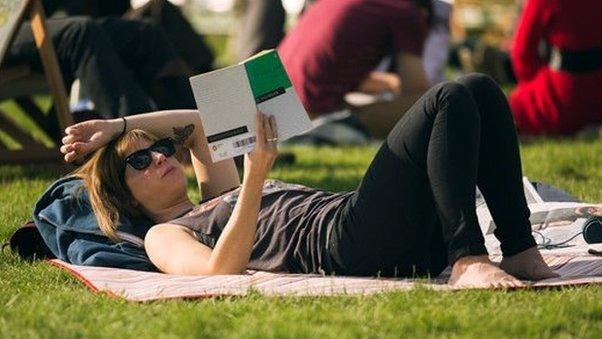 Hay Festival women reading a book