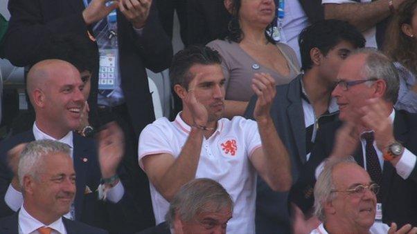 Robin van Persie applauds