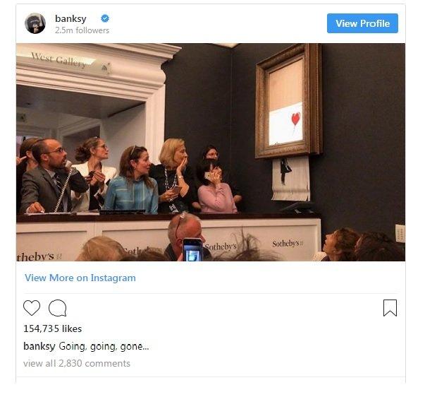 insta post of shocked people watching the Banksy print being shredded