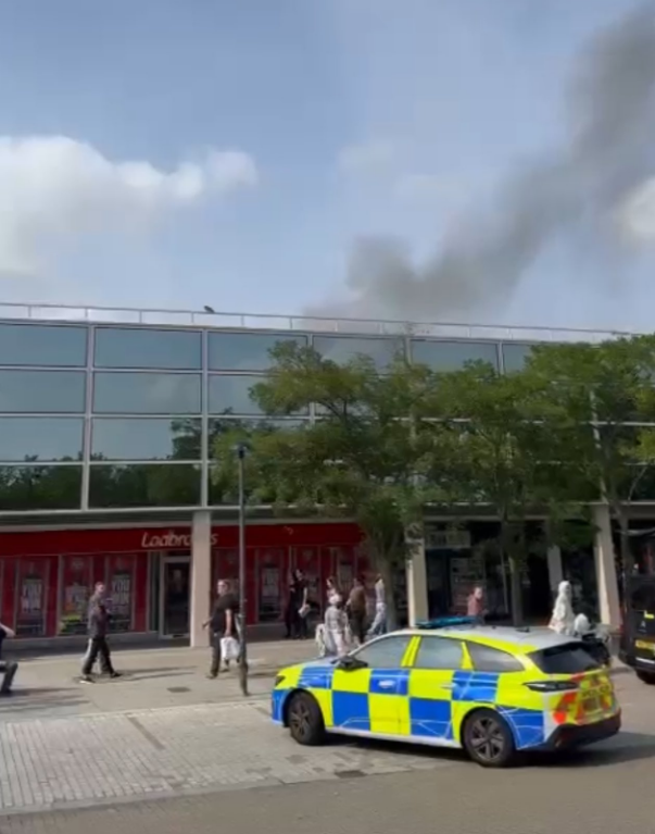 Smoke coming from the top of the shopping centre 