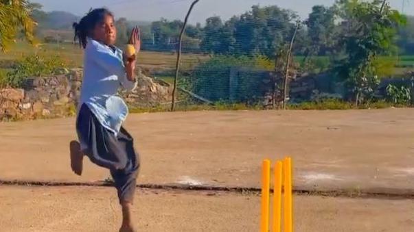 Sushila Meena seen bowling on a makeshift cricket pitch