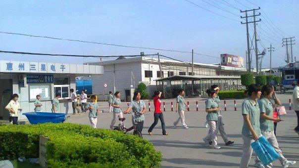 Chinese workers leaving a factory, copyright China Labour Watch