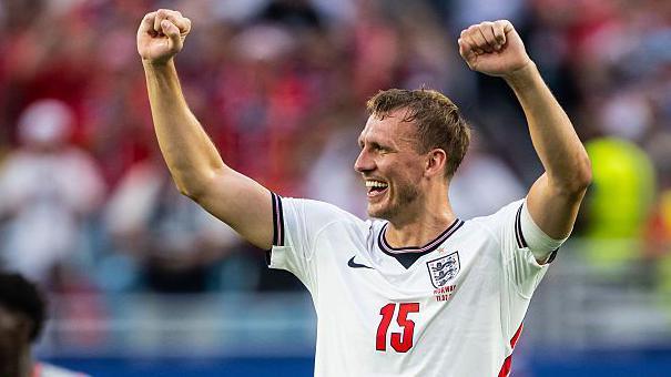 Dan Burn celebrates after England beat Norway in the World Cup quarter-finals