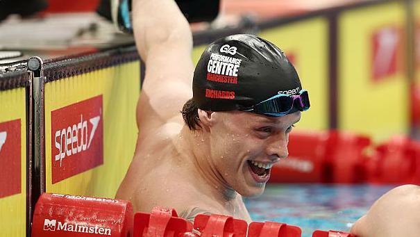 Matt Richards celebrates a race win in the pool