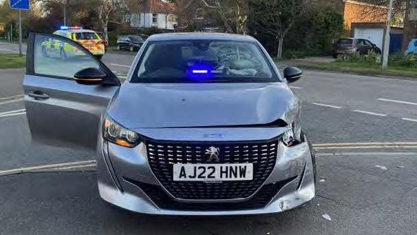 Joshua Pembrocke's Peugeot 208 with blue lights on it and damage to its front