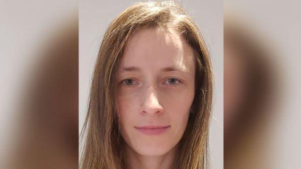 A head and shoulders picture of Kristine Sparane - she has blue eyes and light brown shoulder-length hair
