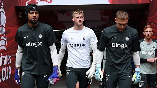 Rob Sanchez, Teddy Sharman-Lowe and Filip Jorgensen walking out of the tunnel to do a warm up ahead of the FA Cup final at Wembley