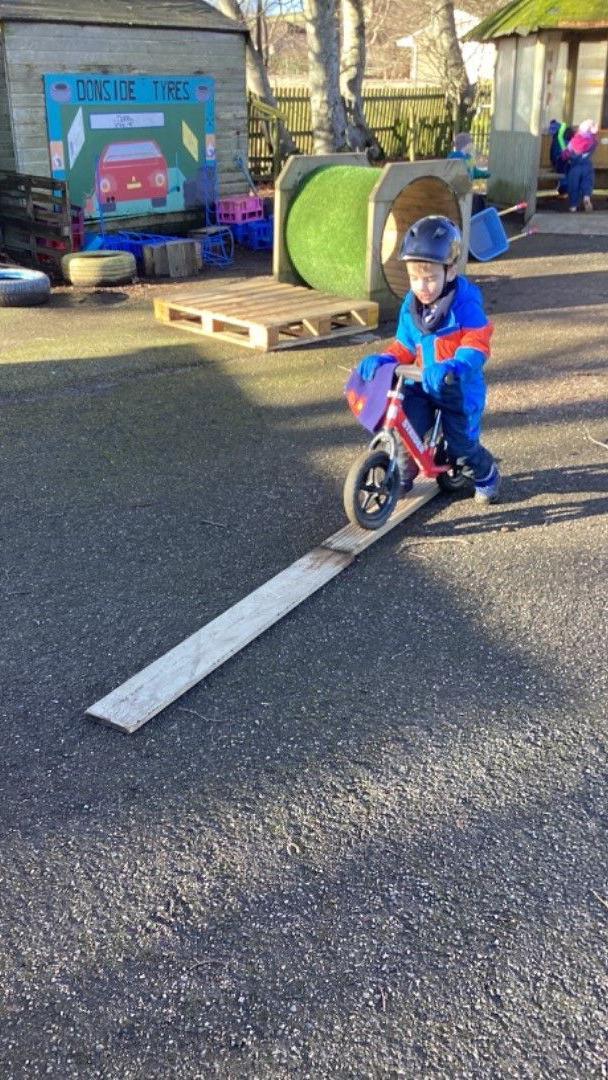 Emily Carter's son playing at nursery 