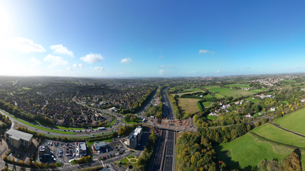 A very wide shot of an empty M4 with surrounding countryside