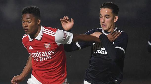 Alfie Massey (right) in action tussling with Arsenal's Reuell Walters during an FA Youth Cup tie