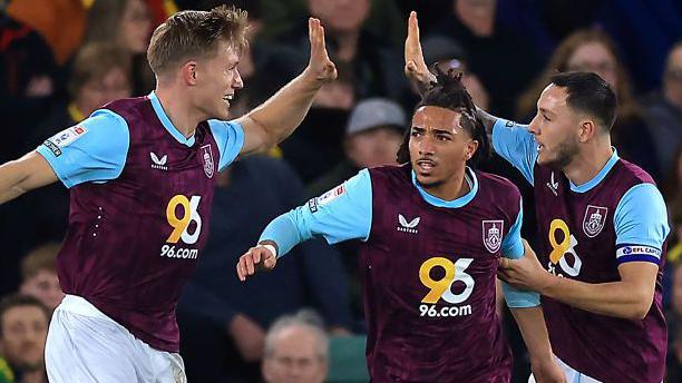 Burnley celebrate their second goal against Norwich City