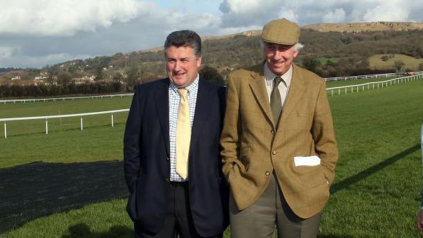 Paul Nicholls (left) stands with Paul Barber (right) at Cheltenham Racecourse