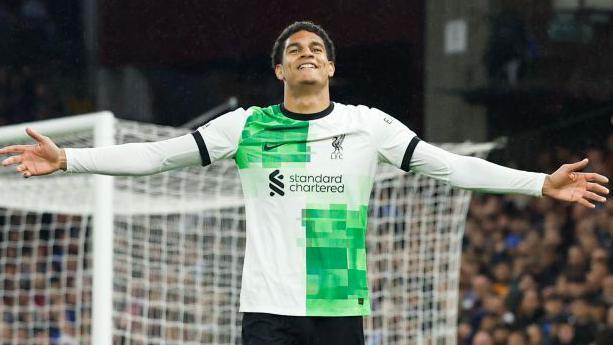 Jarell Quansah celebrates scoring against Aston Villa last season