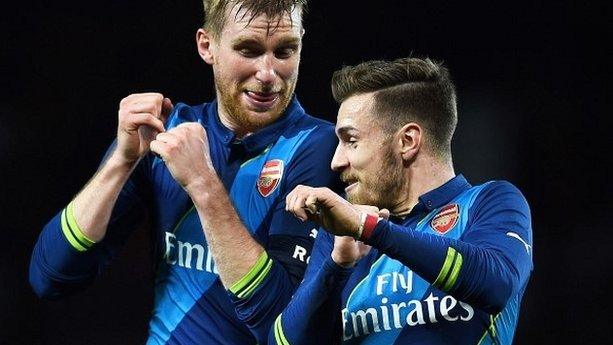 Per Mertesacker and Aaron Ramsey