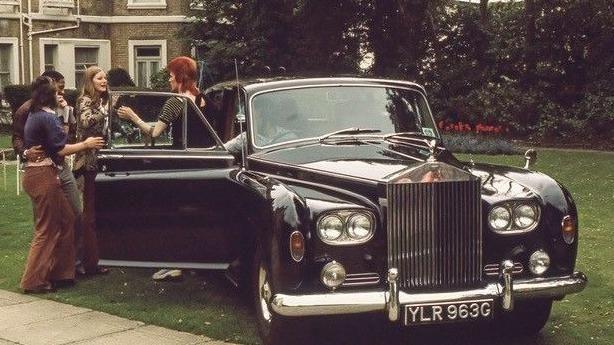 David Bowie meets fans in Bournemouth in 1973 he can be seen with his flaming red hair leaving a black rolls royce car
