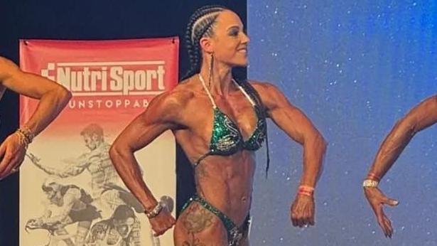 Emily Carrasquillo at a bodybuilding event