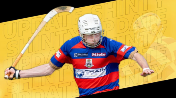 Kingussie shinty player in action