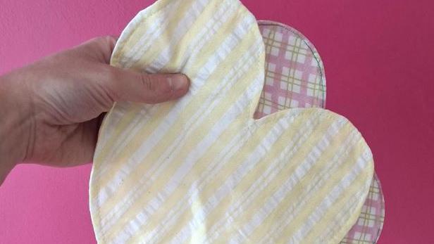 Yellow and pink cotton bonding hearts at Rotherham Hospital.