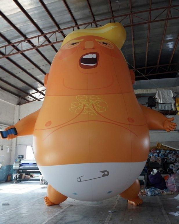 trump balloon in a warehouse