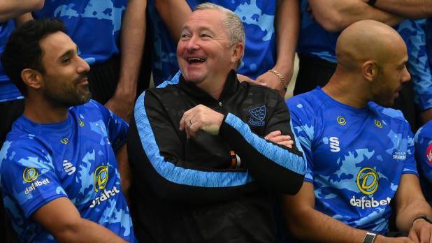 Paul Farbrace laughing with Sussex players