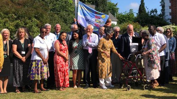 Flag raising ceremony in Exeter