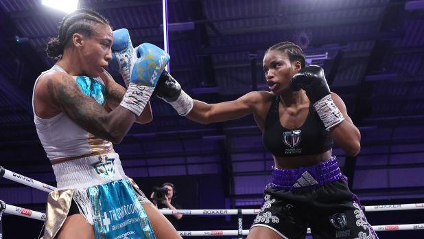 Caroline Dubois throws a jab astatine  Jessica Camara