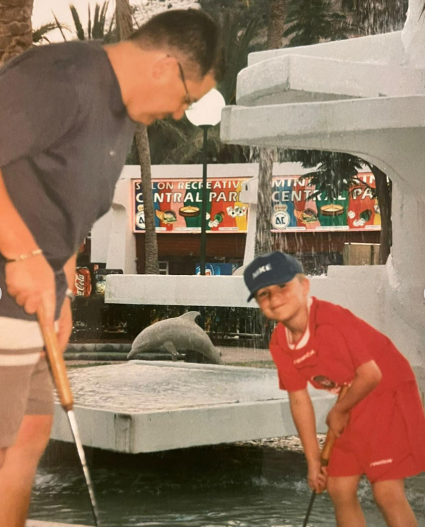 Aaron McGowan when he was younger wearing a Liverpool kit on holiday with his Dad