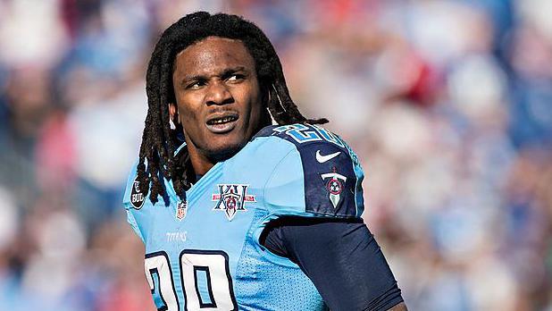 Chris Johnson of the Tennessee Titans watches a replay during a game against the Houston Texans in December 2013