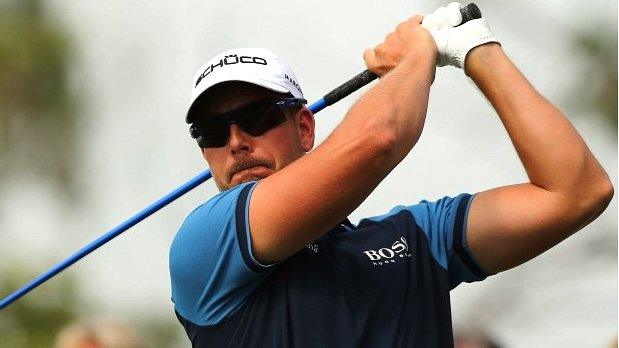 Henrik Stenson in first-round action at the World Tour Championship in Dubai