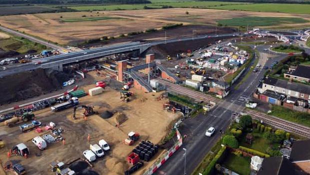 An aerial view of Newsham station while it was being constructed showing a new road bridge. Newsham signal box is visible in the corner of the picture 